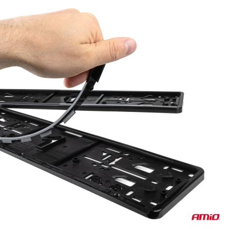 Ramka tablicy rejestracyjnej 520x110mm EU AMIO 04780