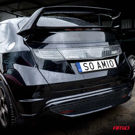 Ramka tablicy rejestracyjnej 520x110mm EU AMIO 04780