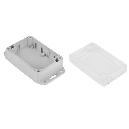 Obudowa 70x105, h=40mm, przezroczysta/jasnoszara z uszczelką, z tulejkami mosiężnymi, z mocowaniem, Z128